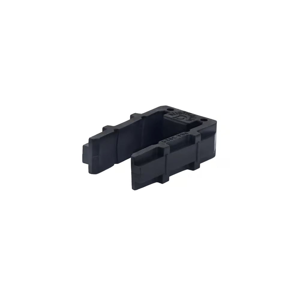 Black plastic component on a white background