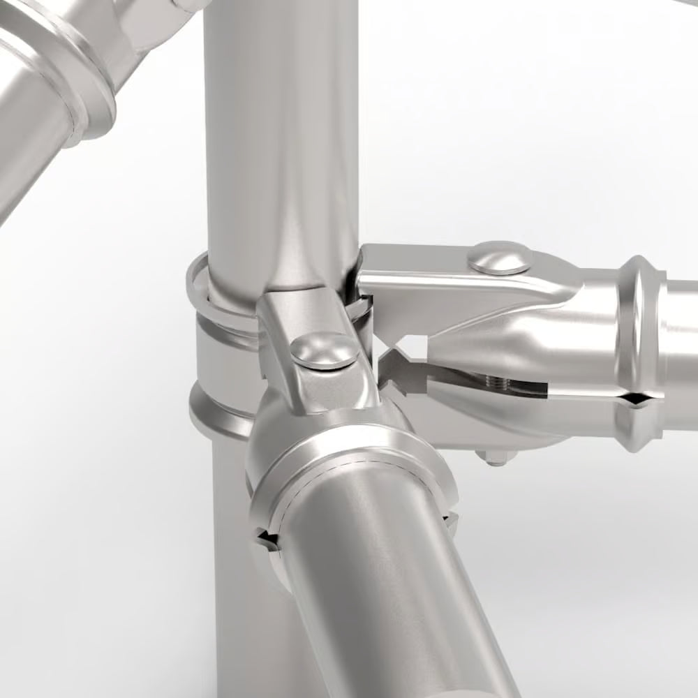Close-up of a metallic pipe system on a white background