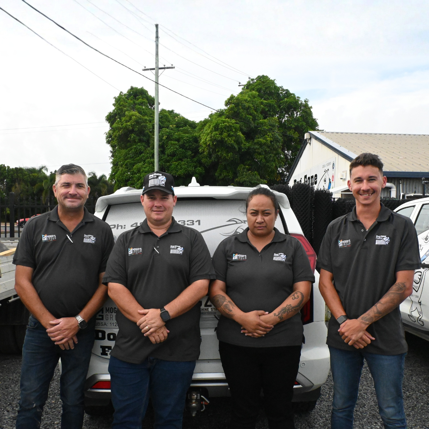 Four sales team members from Dog Gone Fencing 
