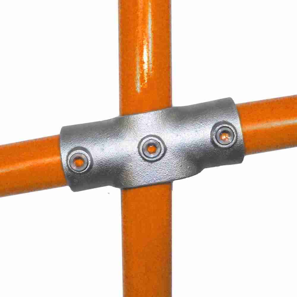 Metal connector with orange pipes on a white background