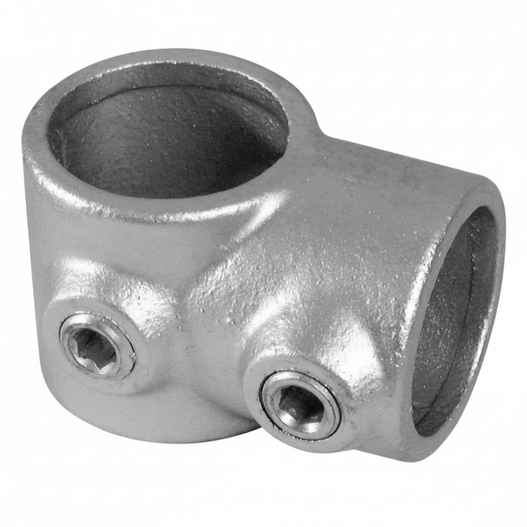 Metal fitting with two holes on a white background