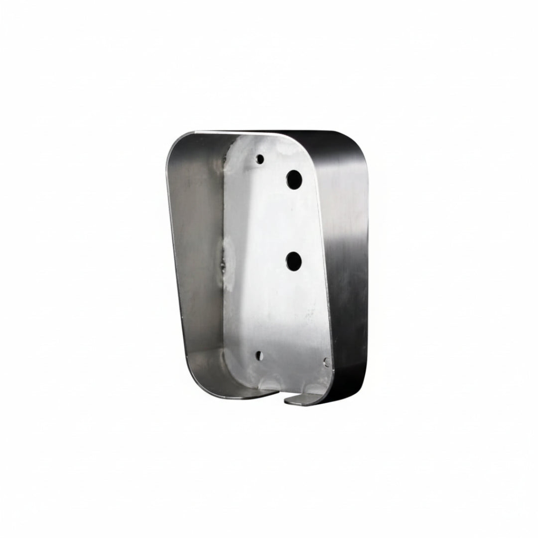 Metallic object with rounded edges and holes on a white background