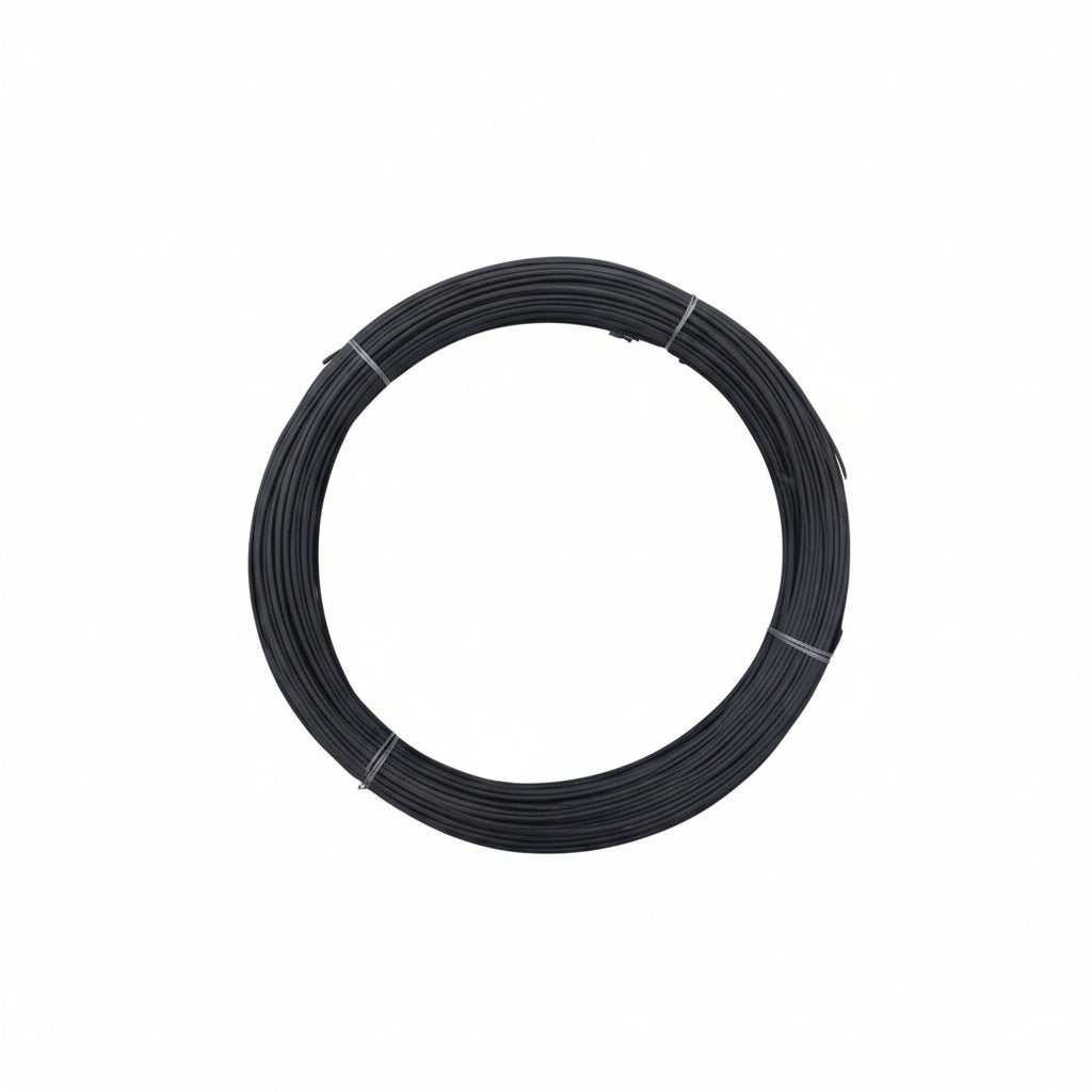 Coiled black wire on a white background