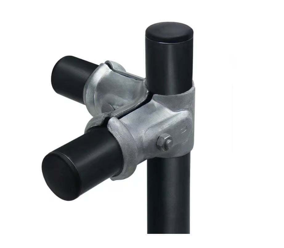 Metal and black pipe fitting on a white background